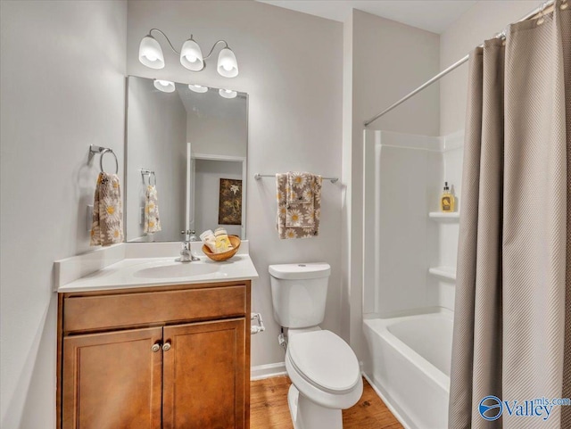 27004 Mill Creek Dr, Athens, AL 35613 - bathroom featuring wood finished floors, vanity, baseboards, toilet, and shower / tub combo with curtain