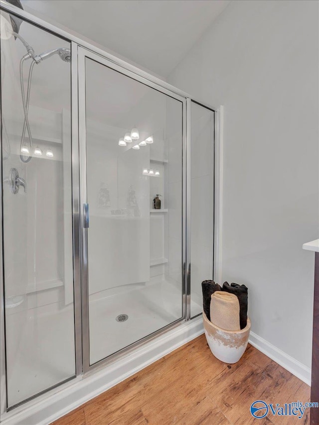27004 Mill Creek Dr, Athens, AL 35613 - bathroom with wood finished floors and a stall shower