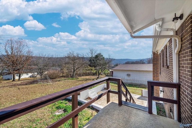 balcony featuring a mountain view