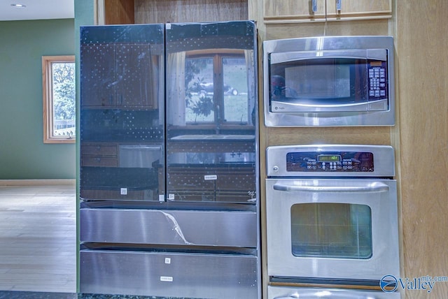 kitchen featuring light brown cabinets