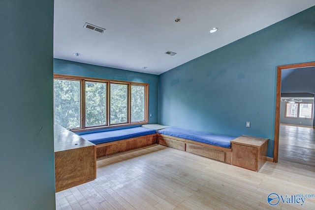 mudroom with light hardwood / wood-style floors