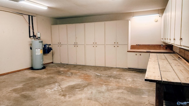 garage featuring water heater