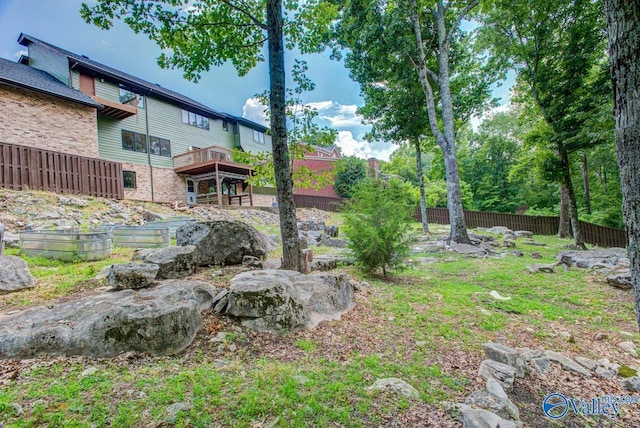 view of yard with a deck