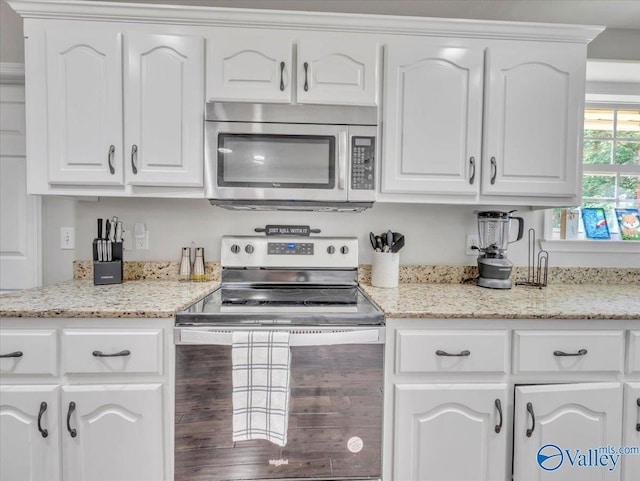 78 Bob Cir, Scottsboro, AL 35769 - kitchen featuring stainless steel appliances, white cabinets, and light stone countertops