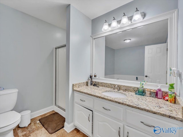 78 Bob Cir, Scottsboro, AL 35769 - full bath featuring vanity, toilet, a shower stall, and baseboards