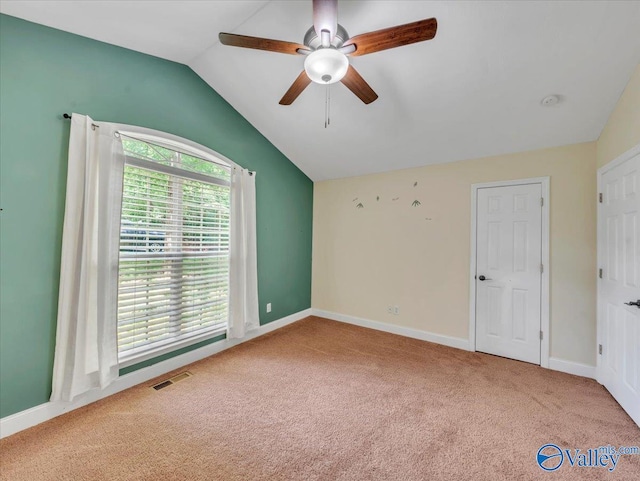 78 Bob Cir, Scottsboro, AL 35769 - unfurnished bedroom featuring carpet, vaulted ceiling, baseboards, and a ceiling fan