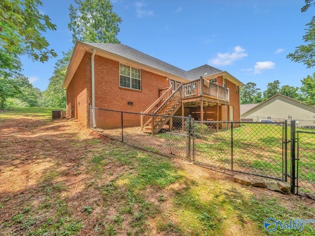 78 Bob Cir, Scottsboro, AL 35769 - back of house with a gate, stairs, brick siding, and a wooden deck