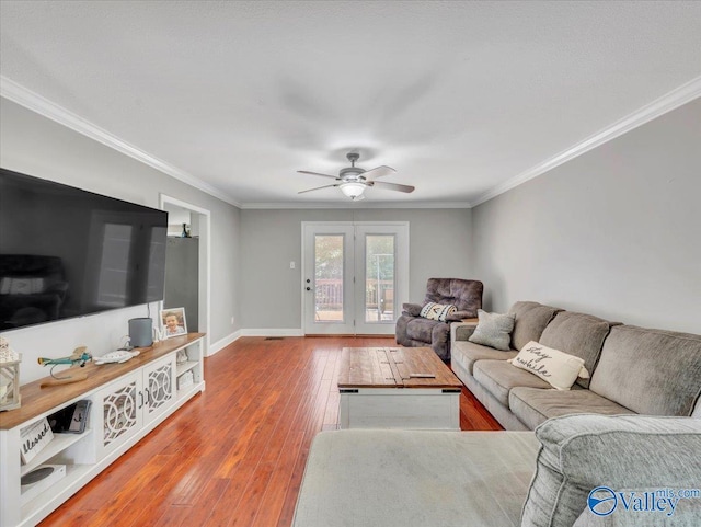 78 Bob Cir, Scottsboro, AL 35769 - living area with crown molding, ceiling fan, wood-type flooring, and baseboards