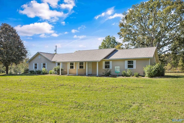 ranch-style house featuring a front lawn