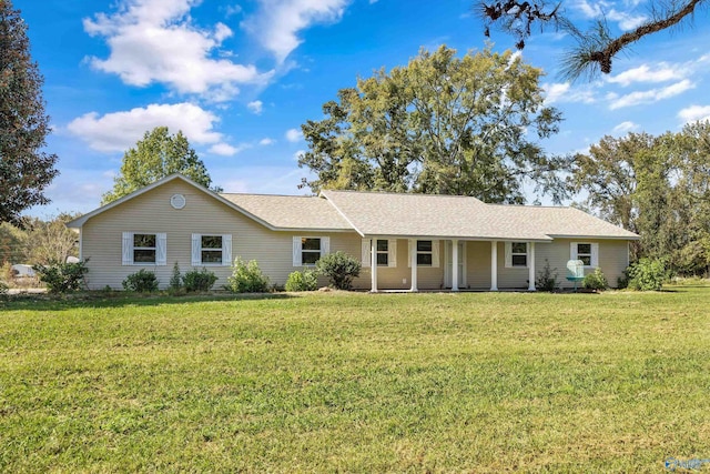 ranch-style house featuring a front lawn