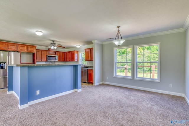 kitchen featuring light carpet, baseboards, ornamental molding, and stainless steel appliances