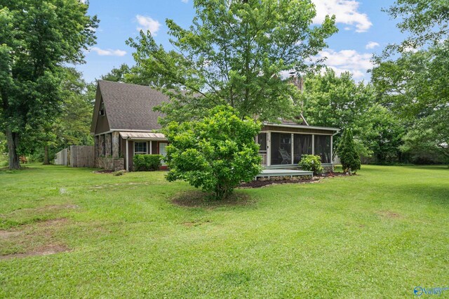 175 Short St, Geraldine, AL 35974 - view of front of house with a sunroom, a front yard, and a chimney