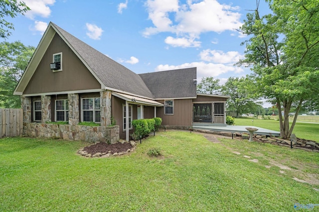 175 Short St, Geraldine, AL 35974 - rear view of house with a sunroom, stone siding, and roof with shingles
