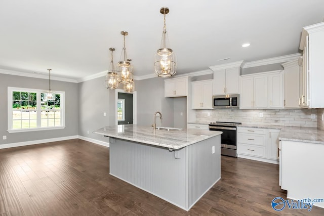 kitchen with white cabinetry, sink, appliances with stainless steel finishes, a kitchen island with sink, and dark hardwood / wood-style flooring