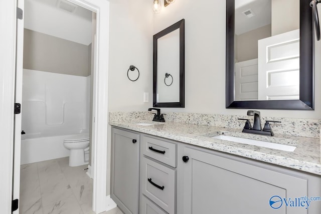 full bathroom with toilet, vanity, and shower / bathtub combination