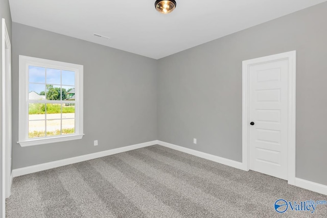 empty room with carpet floors