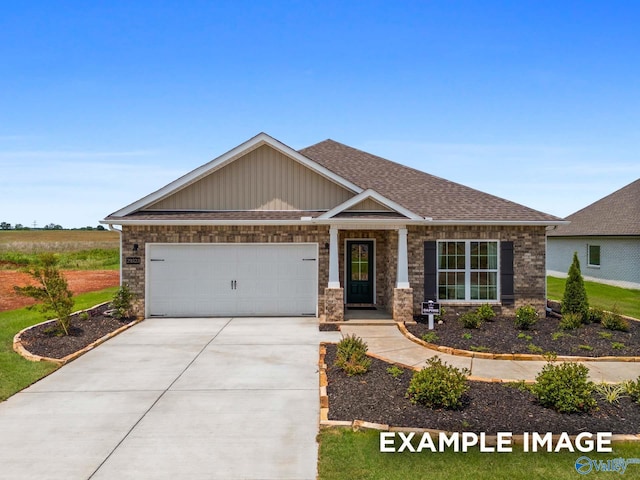 29555 Canoe Cir, Harvest, AL 35749 - craftsman house with roof with shingles, an attached garage, brick siding, and concrete driveway