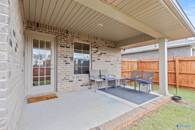 view of patio with fence