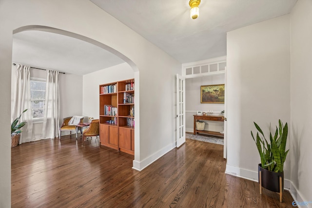 interior space with dark hardwood / wood-style floors