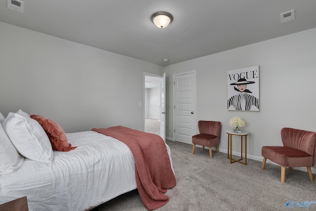bedroom featuring baseboards, carpet, and visible vents