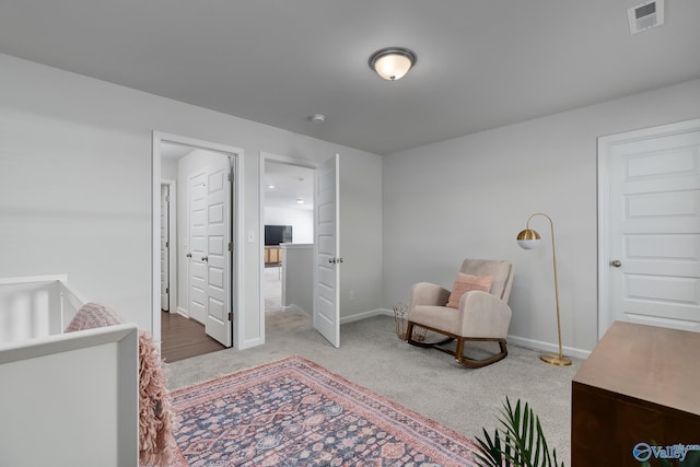 bedroom with baseboards, carpet, and visible vents