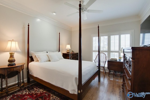 bedroom featuring ceiling fan, dark hardwood / wood-style flooring, and ornamental molding