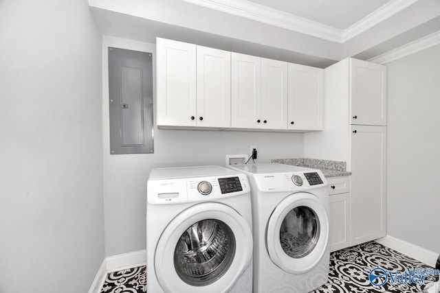washroom featuring washer and dryer, cabinet space, electric panel, baseboards, and crown molding