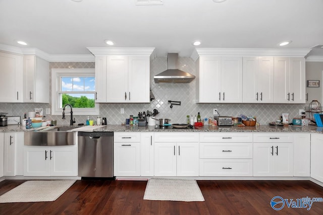 kitchen featuring decorative backsplash, white cabinetry, wall chimney range hood, stainless steel dishwasher, and dark wood finished floors