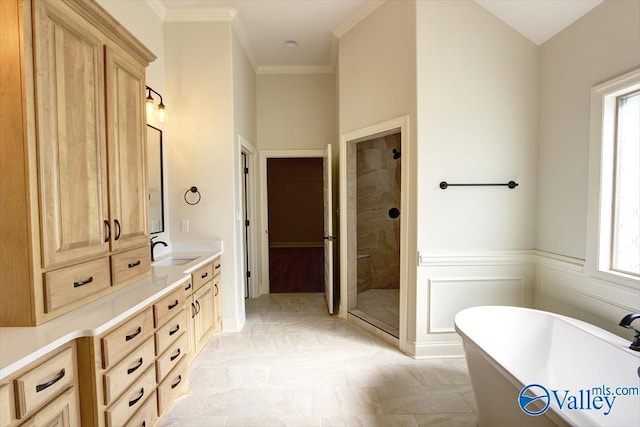 bathroom with vanity, separate shower and tub, and ornamental molding