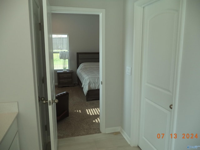 319 Jackson Point Cir, Huntsville, AL 35811 - bedroom featuring baseboards and light colored carpet