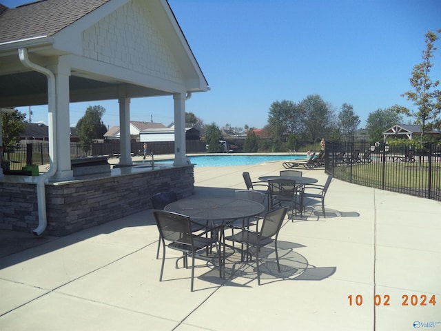 319 Jackson Point Cir, Huntsville, AL 35811 - view of patio / terrace with fence, a community pool, and a gazebo
