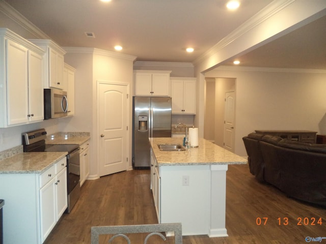319 Jackson Point Cir, Huntsville, AL 35811 - kitchen featuring appliances with stainless steel finishes, a sink, open floor plan, white cabinets, and crown molding