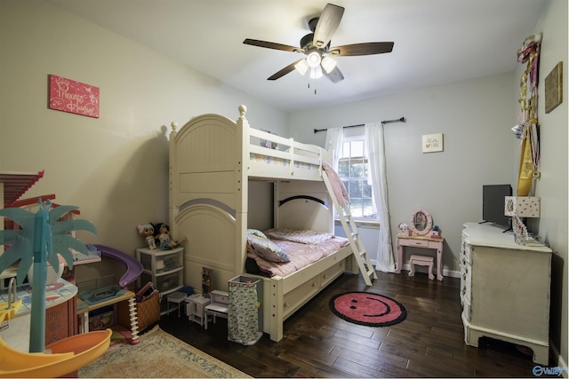 bedroom featuring ceiling fan and dark hardwood / wood-style floors