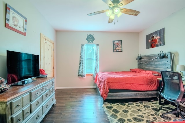 bedroom featuring ceiling fan and dark wood-type flooring