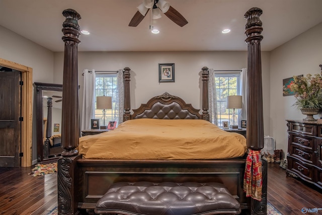 bedroom featuring ceiling fan and dark hardwood / wood-style floors