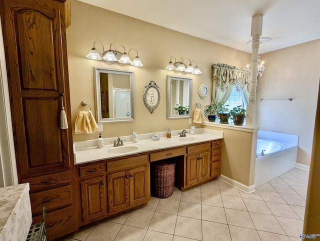 full bath with a garden tub, tile patterned flooring, a sink, and double vanity