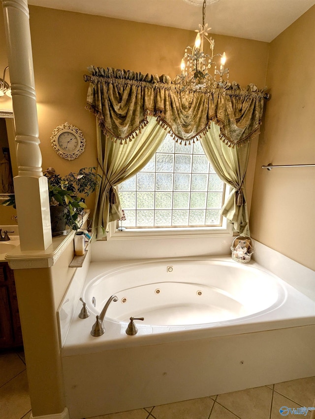 bathroom with tile patterned floors, a notable chandelier, and a whirlpool tub
