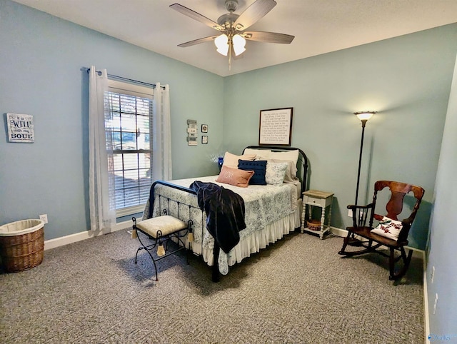 bedroom featuring carpet, ceiling fan, and baseboards