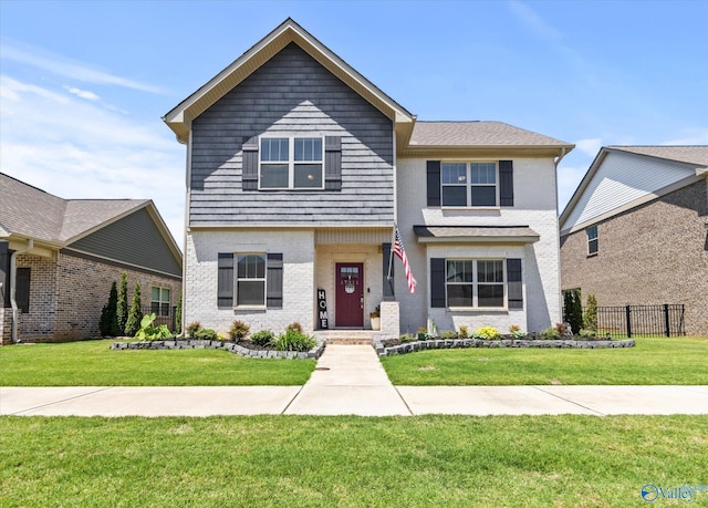 view of front property with a front lawn