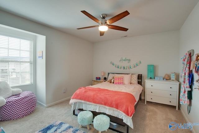 carpeted bedroom with ceiling fan