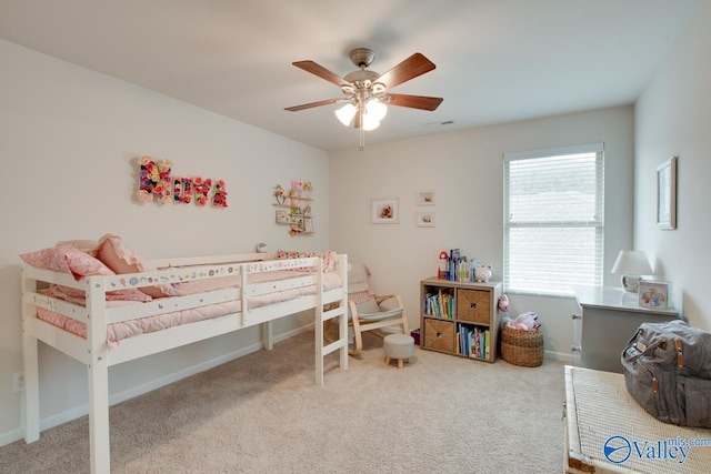 bedroom with ceiling fan and carpet