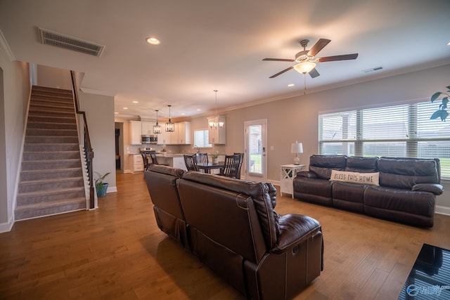 24337 Beacon Cir, Athens, AL 35613 - living room with recessed lighting, stairs, a ceiling fan, wood finished floors, and crown molding