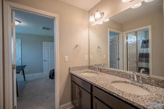 24337 Beacon Cir, Athens, AL 35613 - full bath with double vanity, baseboards, and curtained shower