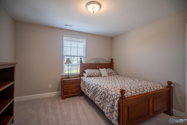 24337 Beacon Cir, Athens, AL 35613 - bedroom featuring baseboards and light carpet