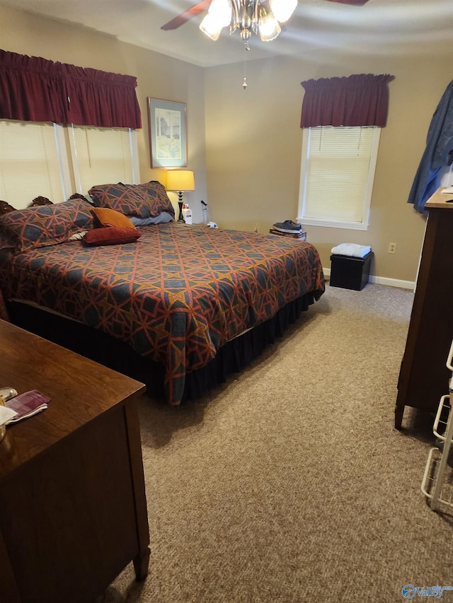 2505 E Broad St, Gadsden, AL 35905 - carpeted bedroom featuring baseboards and a ceiling fan