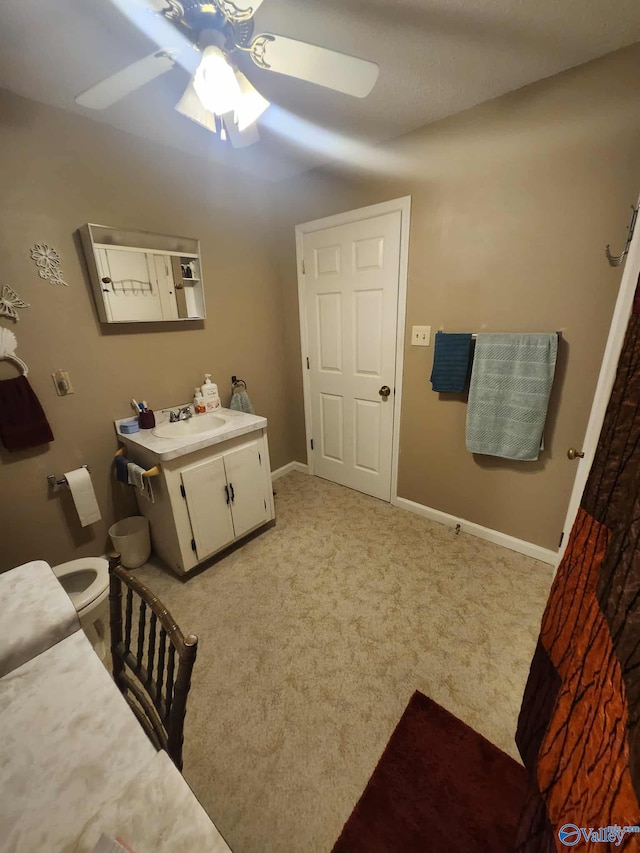2505 E Broad St, Gadsden, AL 35905 - bathroom with a ceiling fan, baseboards, and vanity
