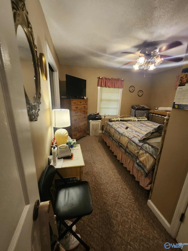 2505 E Broad St, Gadsden, AL 35905 - carpeted bedroom featuring a ceiling fan and a textured ceiling