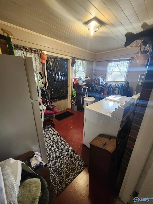 2505 E Broad St, Gadsden, AL 35905 - kitchen featuring freestanding refrigerator, plenty of natural light, independent washer and dryer, and wood ceiling