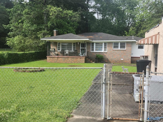2505 E Broad St, Gadsden, AL 35905 - view of front facade featuring a gate, covered porch, brick siding, and a chimney