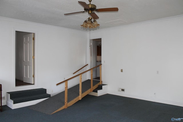 interior space with crown molding and ceiling fan